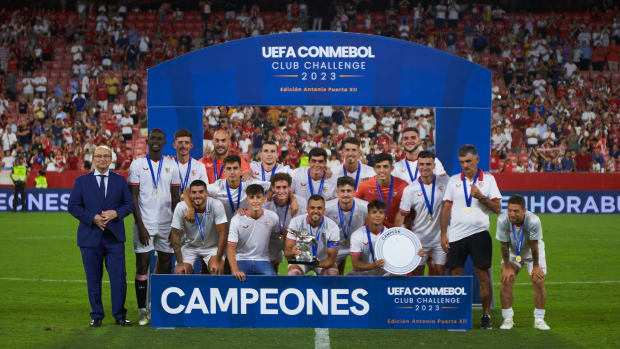 The Sevilla team pictured celebrating after winning the first ever edition of the UEFA–CONMEBOL Club Challenge in July 2023